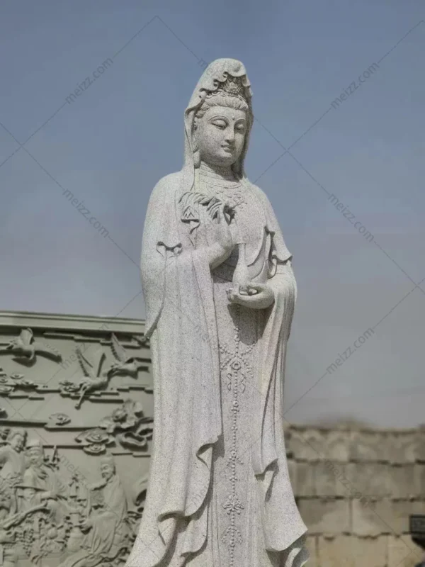 kuan yin stone statue