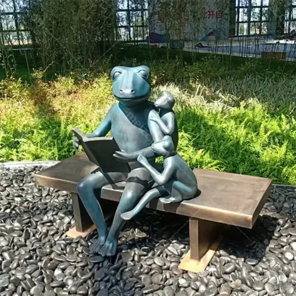 reading frog garden statue