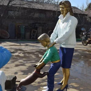 Bronze family of 3 with a dog sculpture