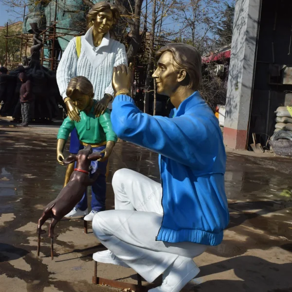 Bronze family of 3 with a dog sculpture