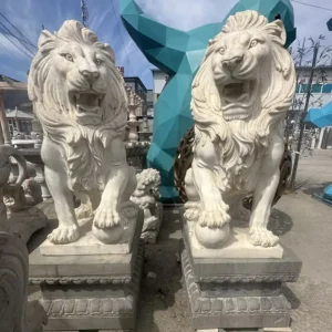 Lion Statue with Paw on Ball