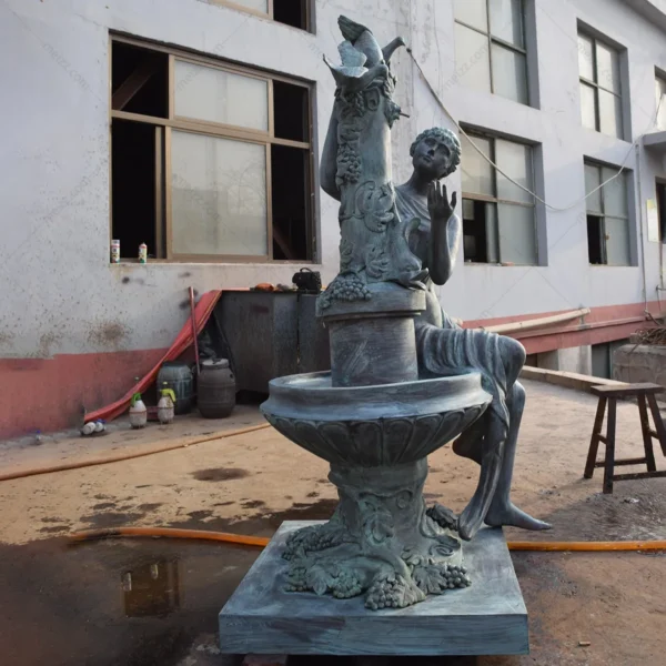 Outdoor Bronze Fountain with a Naked Woman and Two Birds