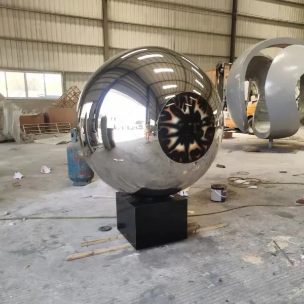 Large outdoor stainless steel ball sculpture