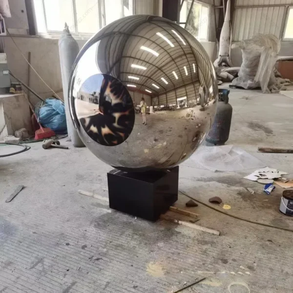 Large outdoor stainless steel ball sculpture