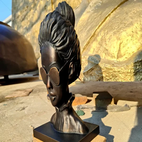 bronze bust woman