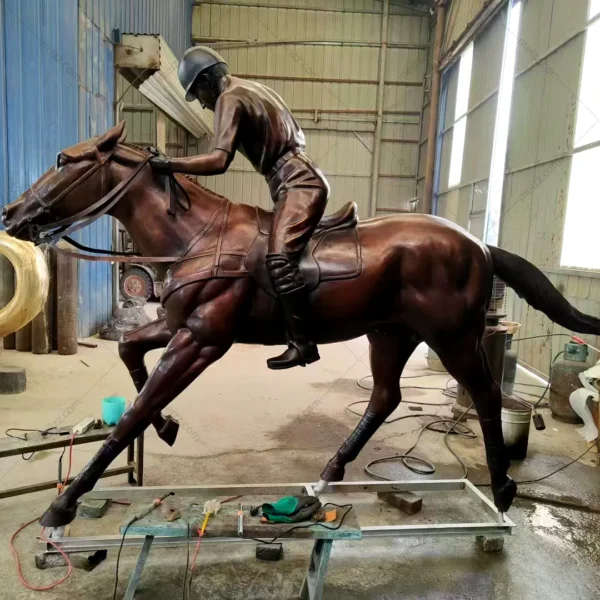 bronze polo player statue