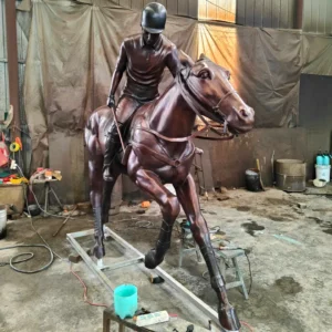 bronze polo player statue