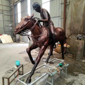 bronze polo player statue