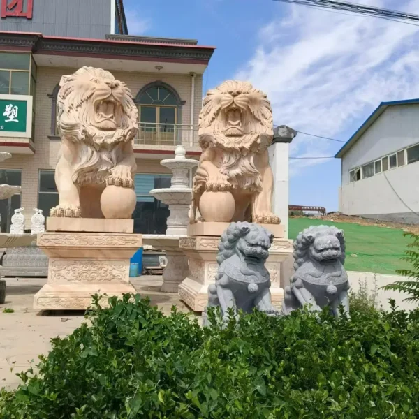 lion holding ball statue