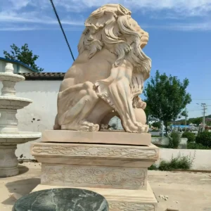 lion holding ball statue