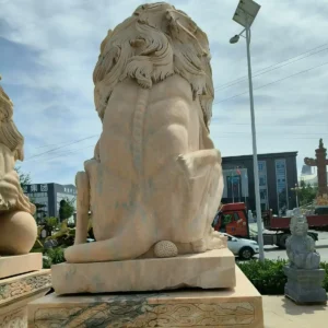 lion holding ball statue