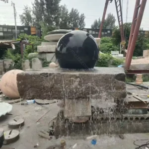 large stone ball water feature