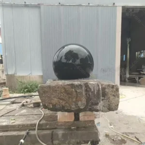 large stone ball water feature