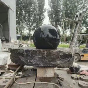 large stone ball water feature