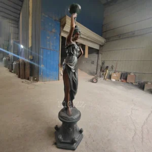 woman statue lamp