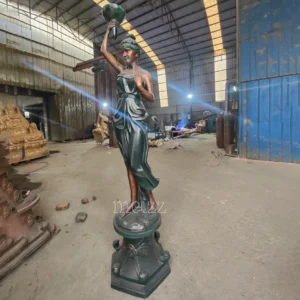 woman statue lamp