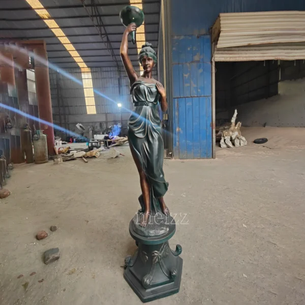 woman statue lamp