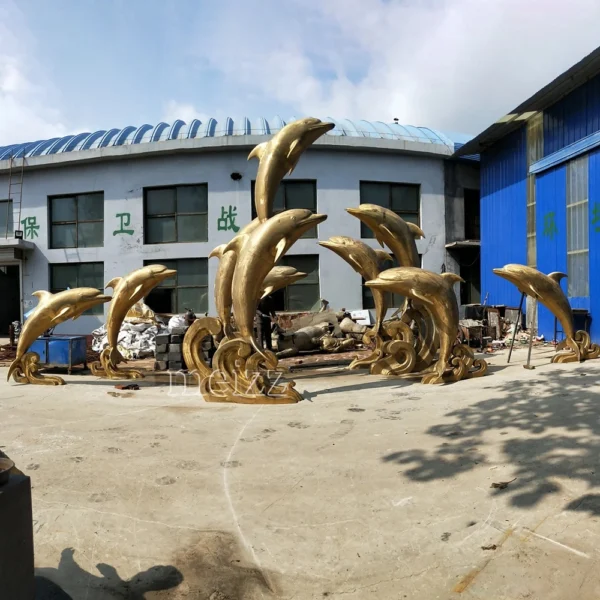 large outdoor dolphin statues