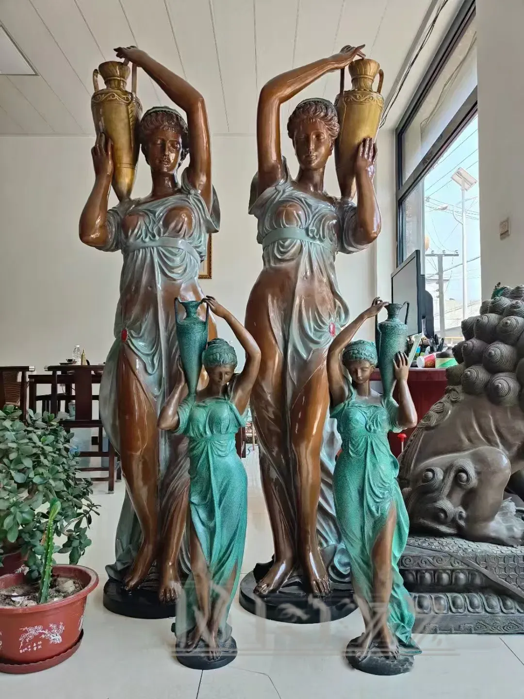 Woman with Vase Statue