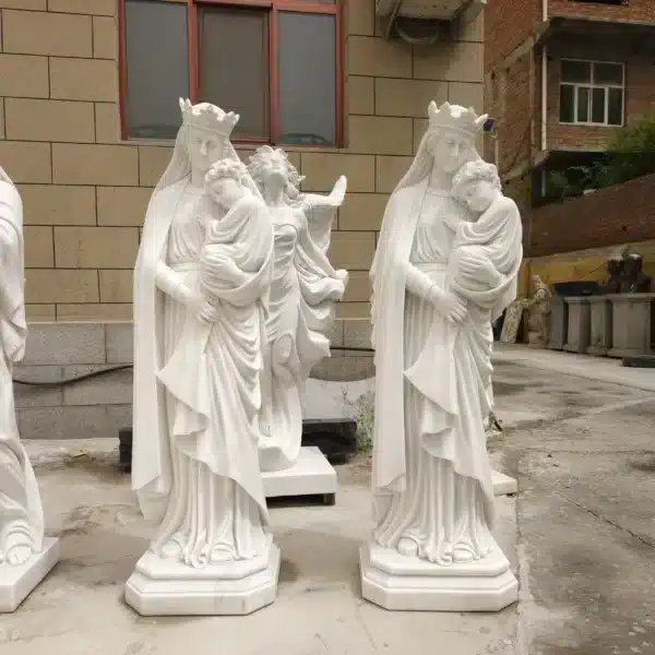 virgin mary holding jesus sculpture
