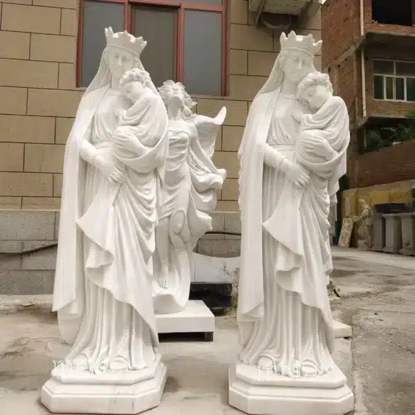 virgin mary holding jesus sculpture