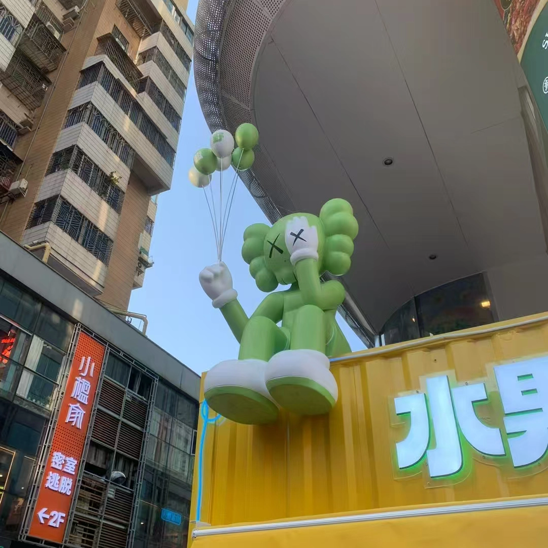 kaws sitting statue