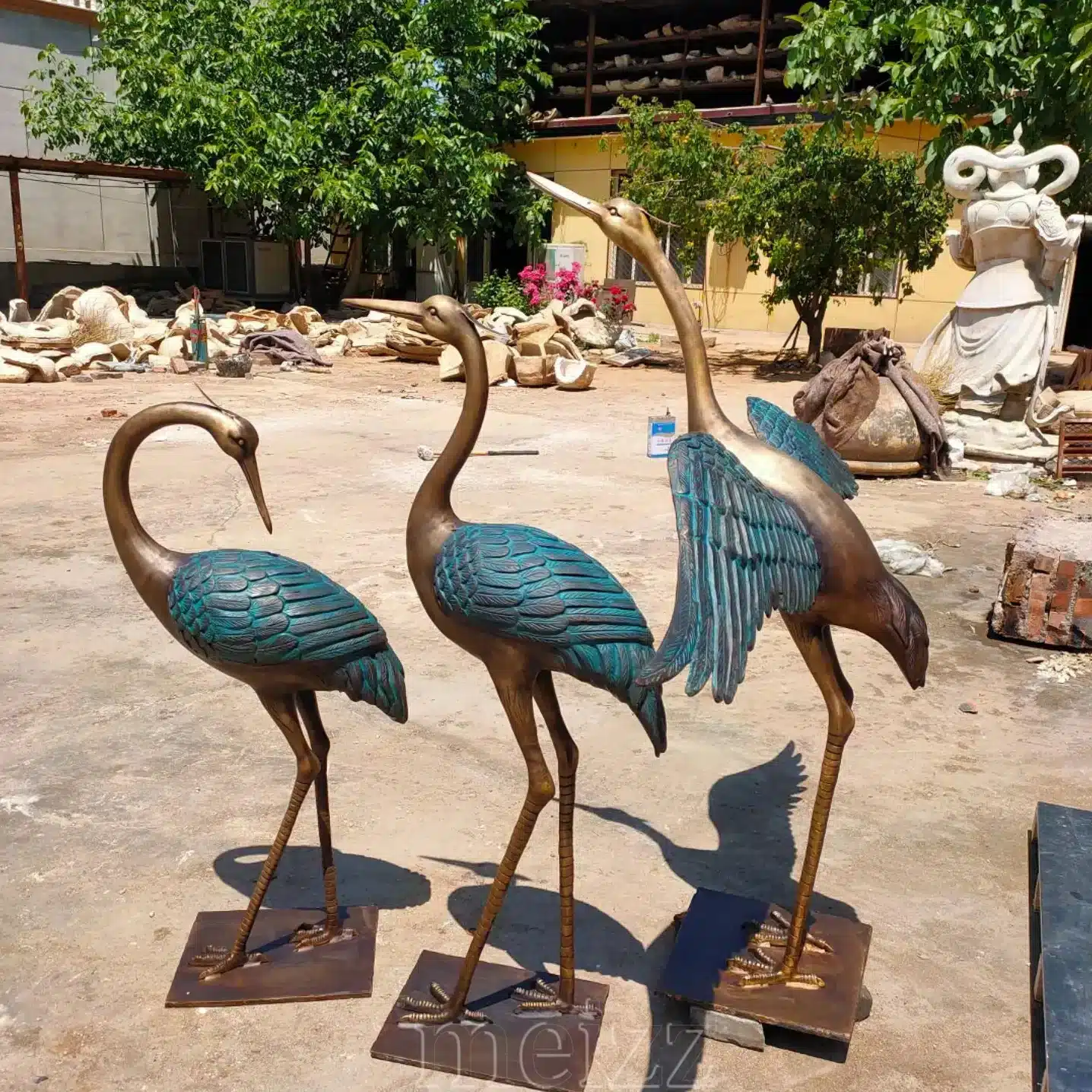 metal garden crane statues
