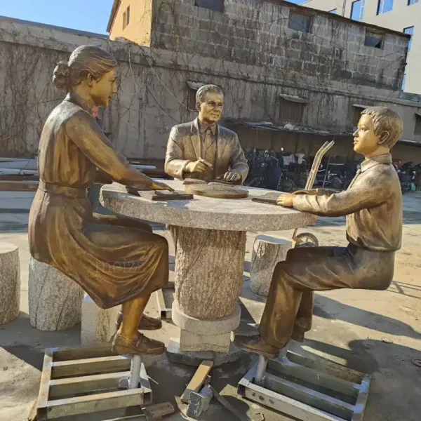 family of three sculpture