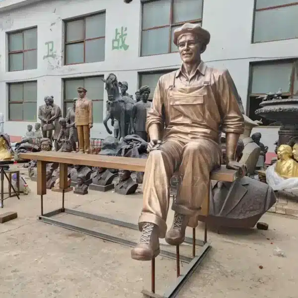 Seated Man on Bench Sculpture