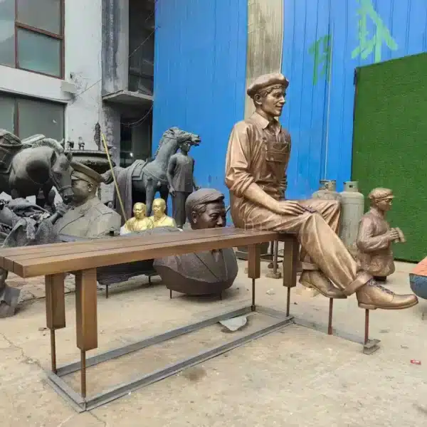 Seated Man on Bench Sculpture