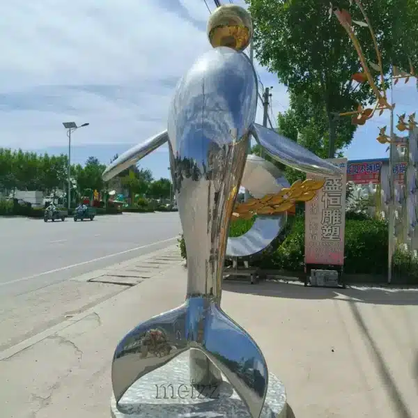 modern stainless steel dolphin sculpture