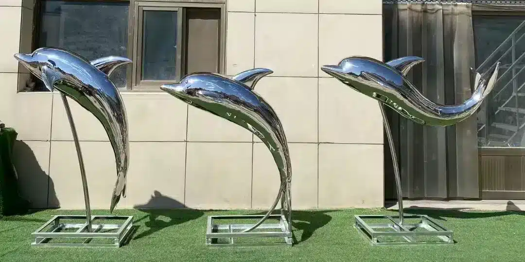 large outdoor dolphin statues