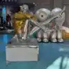 Hajime Sorayama Sculpture for Sale – Futuristic Chrome Seated Figure