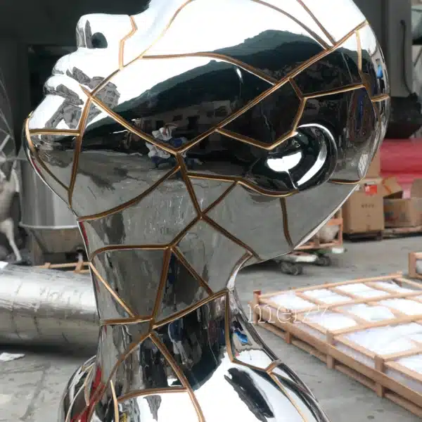 Mirror-Polished Stainless Steel Female Statue (1) Mirror-Polished Stainless Steel Female Statue