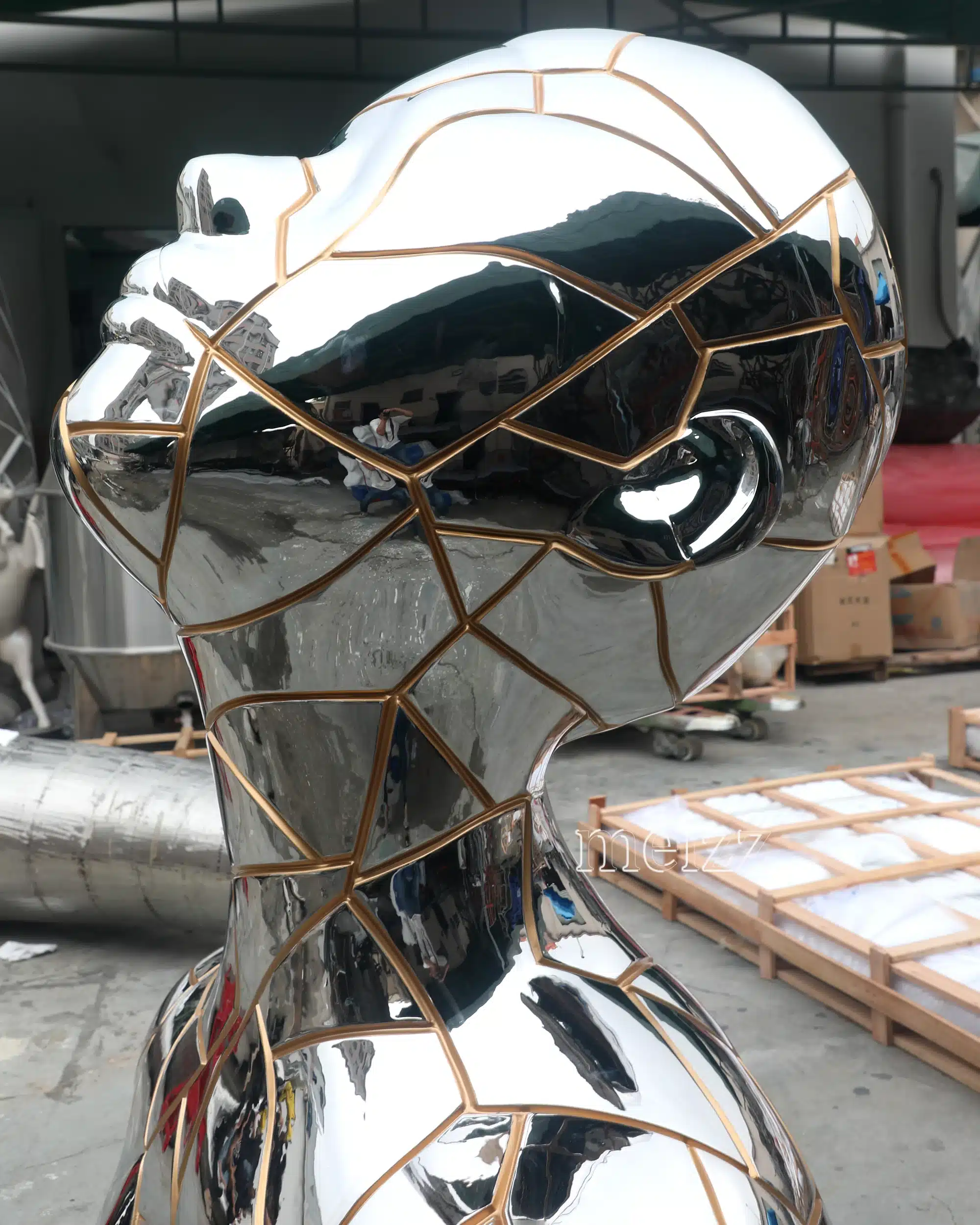 Mirror-Polished Stainless Steel Female Statue (1) Mirror-Polished Stainless Steel Female Statue