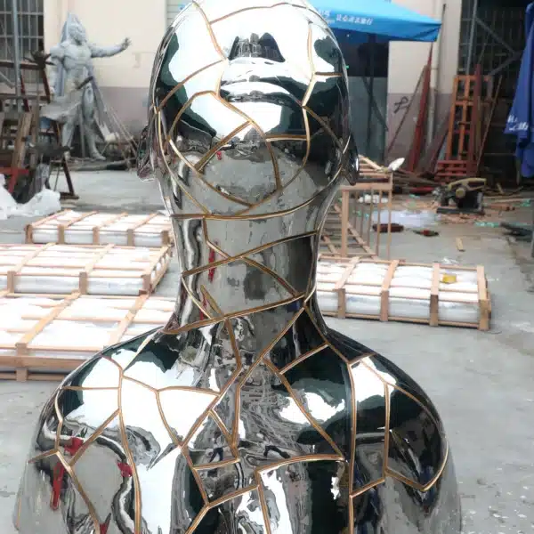 Mirror-Polished Stainless Steel Female Statue (4) Mirror-Polished Stainless Steel Female Statue