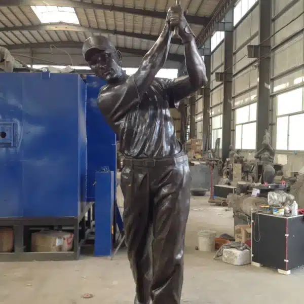 bronze golfer statue