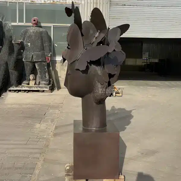 Woman Head with Butterflies Statue