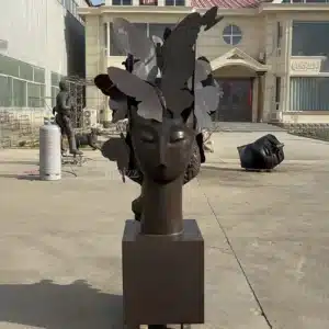 Woman Head with Butterflies Statue
