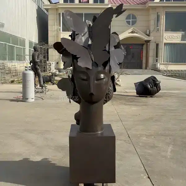 Woman Head with Butterflies Statue