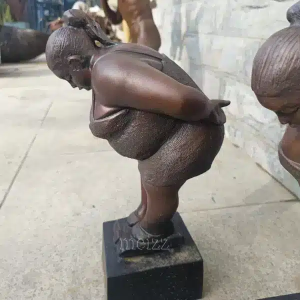 fat woman figurine